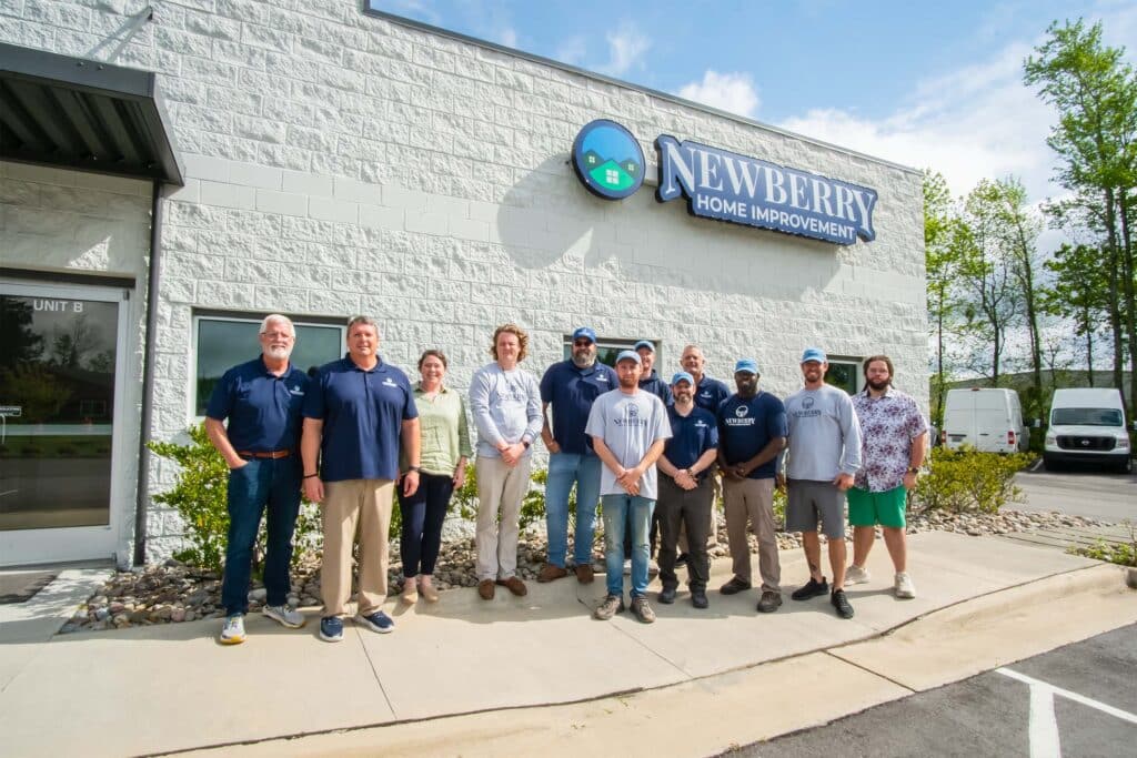 Newberry Home Improvement Wilmington NC team standing together outside the office.